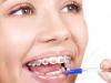 Оголилась шейка зуба: методы лечения и причины